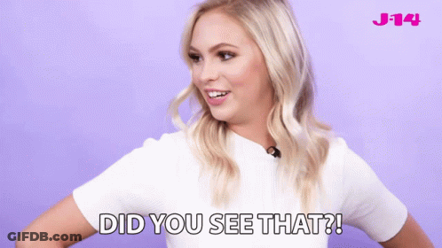 Woman In White Shirt Says Did You See That On Purple Background GIF