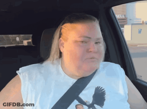 Woman In White Shirt With Bird Sitting In Car With Bell Sign GIF