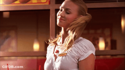 Woman In White Shirt With Name Tag Jenny GIF