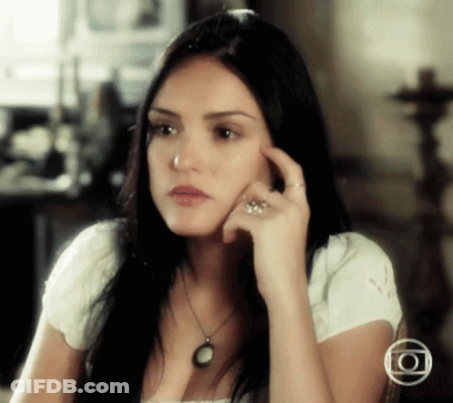 Woman In White Shirt With Necklace And Ring GIF