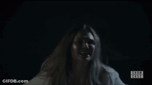 Woman In White Shirt With Show Case GIF