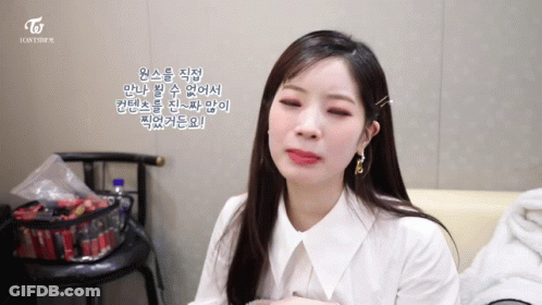 Woman In White Shirt With Twice Logo GIF
