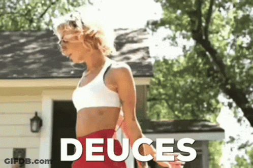 Woman In White Sports Bra And Red Shorts Deuces GIF