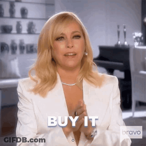 Woman In White Suit Clapping Saying Buy It GIF