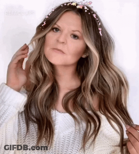 Woman In White Sweater And Headband With Sprinkles GIF