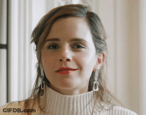 Woman In White Sweater And Silver Earrings GIF