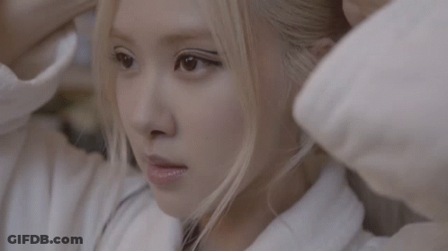 Woman In White Sweater Close Up GIF