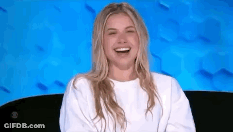 Woman In White Sweater Laughing GIF