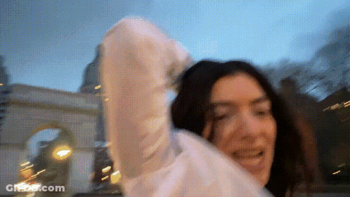 Woman In White Sweater GIF
