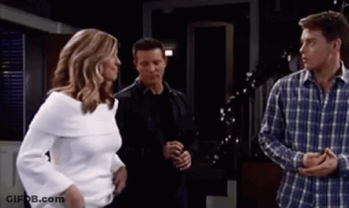 Woman In White Sweater Next To Men In Plaid Shirts GIF