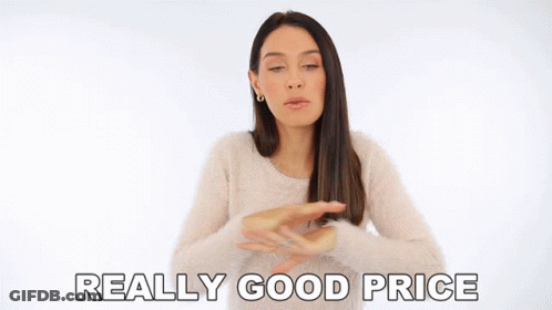 Woman In White Sweater Says Really Good Price Arms Outstretched GIF