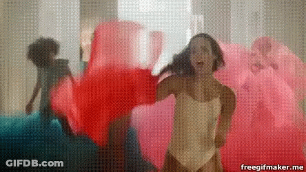 Woman In White Swimsuit Dancing With Group In Pink And Blue GIF