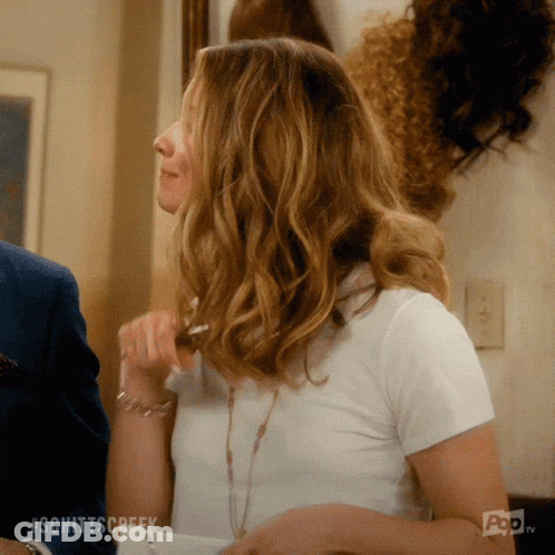 Woman In White T-Shirt Meeting Man In Suit GIF