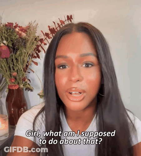 Woman In White T-Shirt Saying Girl What Am I Supposed To Do About That GIF