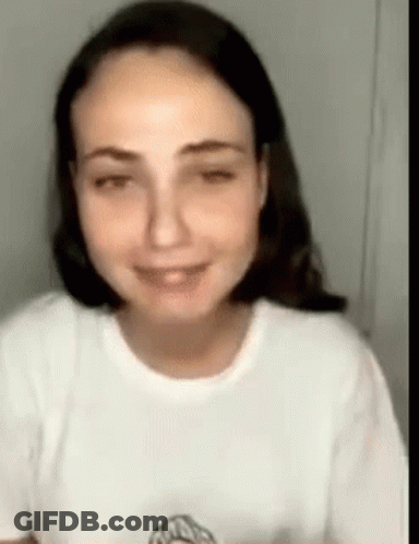 Woman In White T-Shirt Smiling GIF