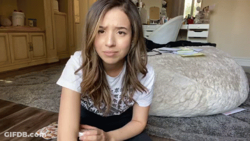 Woman In White T-Shirt With Chinese Writing On Floor GIF