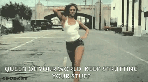 Woman In White Tank Top And Black Shorts GIF