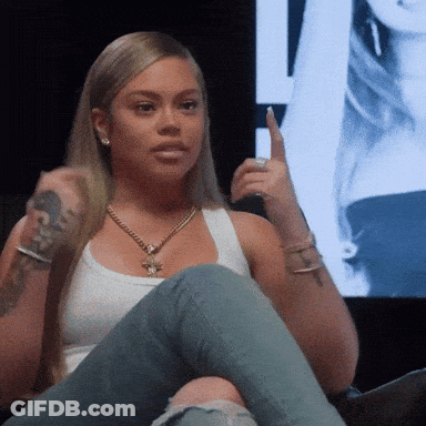 Woman In White Tank Top And Jeans GIF