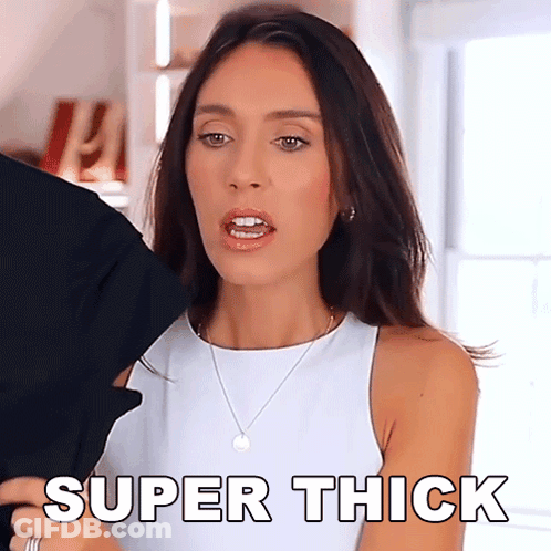 Woman In White Tank Top And Necklace Saying Super Thick GIF