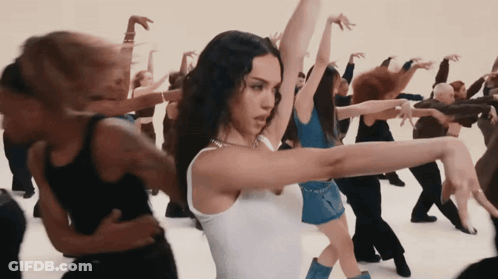 Woman In White Tank Top Dancing In Crowd GIF