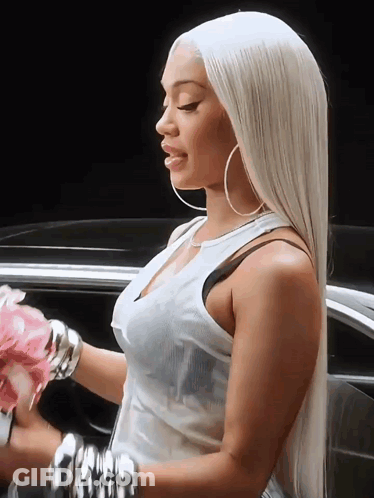 Woman In White Tank Top Holding Bouquet GIF