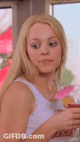 Woman In White Tank Top Holding Drink GIF