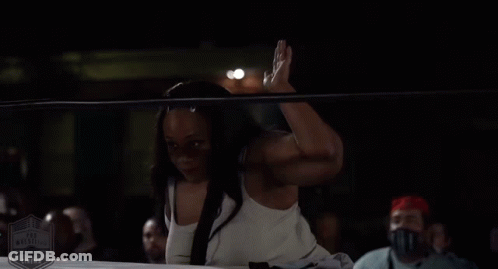 Woman In White Tank Top In Wrestling Ring GIF