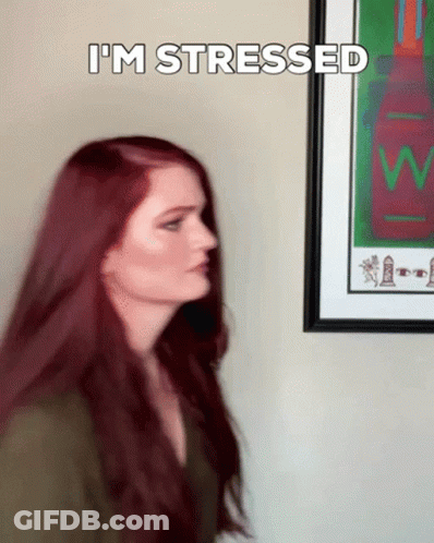 Woman In White Tank Top Looks At Man In Brown Shirt Pranay Varma Video GIF