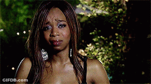Woman In White Tank Top Next To Blonde Woman GIF
