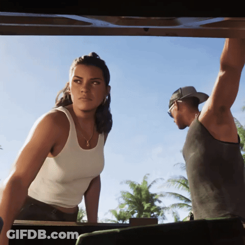 Woman In White Tank Top Next To Man In Baseball Cap GIF