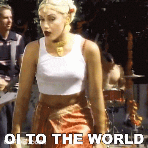 Woman In White Tank Top Saying Oi To The World GIF