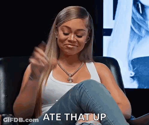 Woman In White Tank Top Sitting Crossed Legs GIF