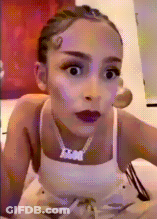 Woman In White Tank Top With Fox Necklace GIF