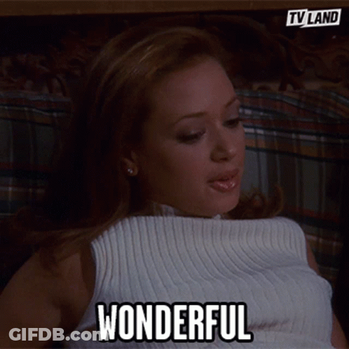 Woman In White Top Says Wonderful GIF