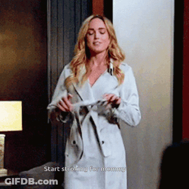 Woman In White Trench Coat Saying Start Stroking For Mommy GIF