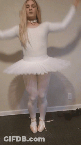 Woman In White Tutu And Pink Pointe Shoes Dancing GIF