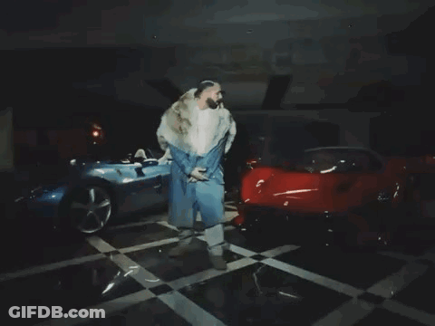 Woman In White Vans Shirt Standing In Doorway GIF