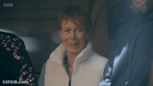 Woman In White Vest Says I Just Farted In Front Of BBC Logo GIF