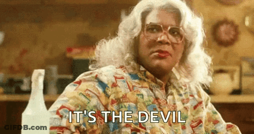 Woman In Wig And Glasses It's The Devil GIF