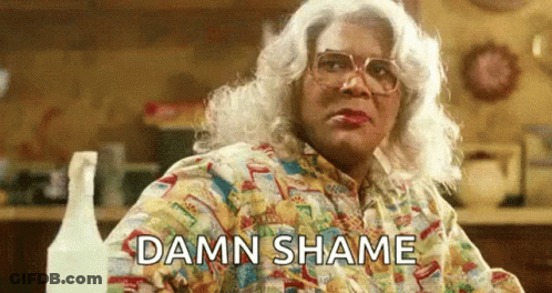Woman In Wig And Glasses Saying Damn Shame GIF