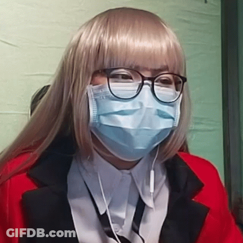Woman In Wig And Mask With Glasses GIF