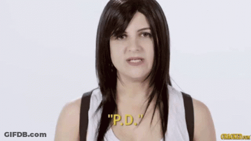 Woman In Wig And White Tank Top Saying Downs GIF