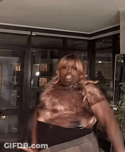 Woman In Wig Dancing With Hands In Air GIF