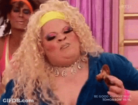 Woman In Wig Eating Chicken, Another Looks GIF