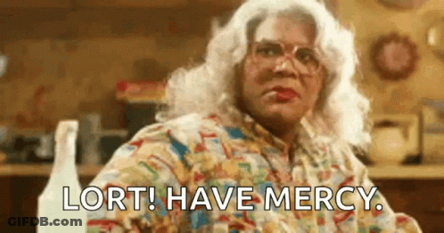 Woman In Wig Glasses Saying Lort Have Mercy GIF
