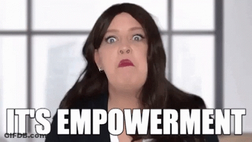 Woman In Wig Making Funny Face Saying It's Empowerment GIF