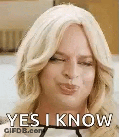 Woman In Wig Making Funny Face Saying Yes I Know GIF