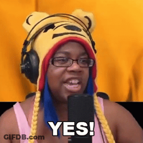 Woman In Winnie The Pooh Hat And Headphones Saying Yes GIF