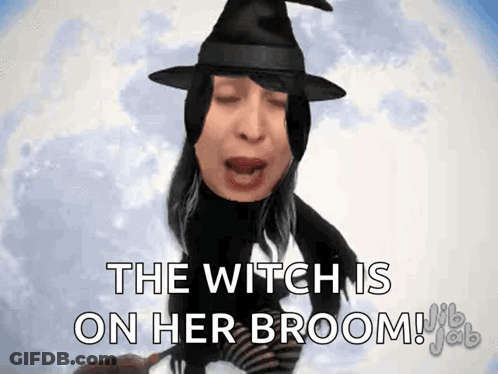 Woman In Witch Costume Flying On Broom GIF