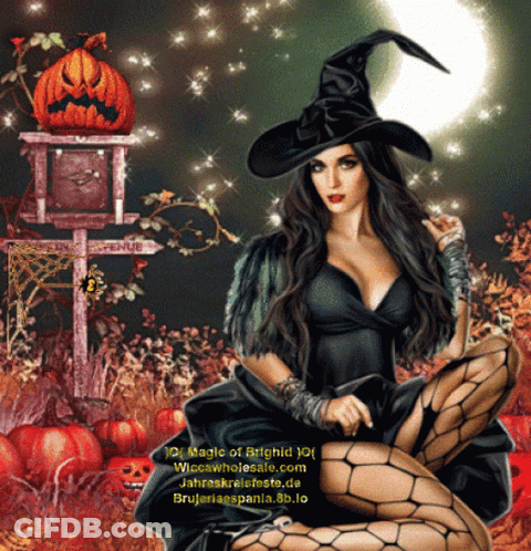 Woman In Witch Costume In Front Of Pumpkin GIF
